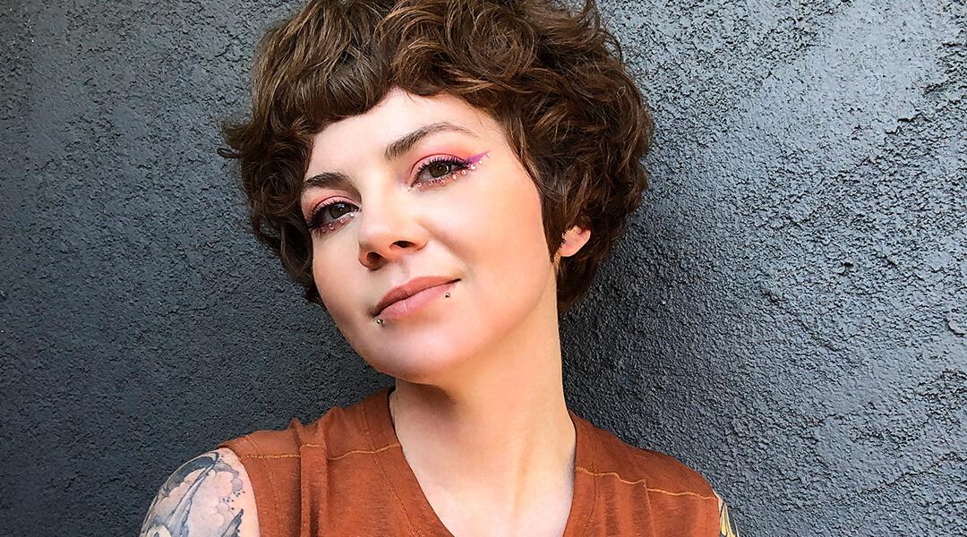 Image of Kirsten Colemen rocking a pink rhinestone makeup look Desktop