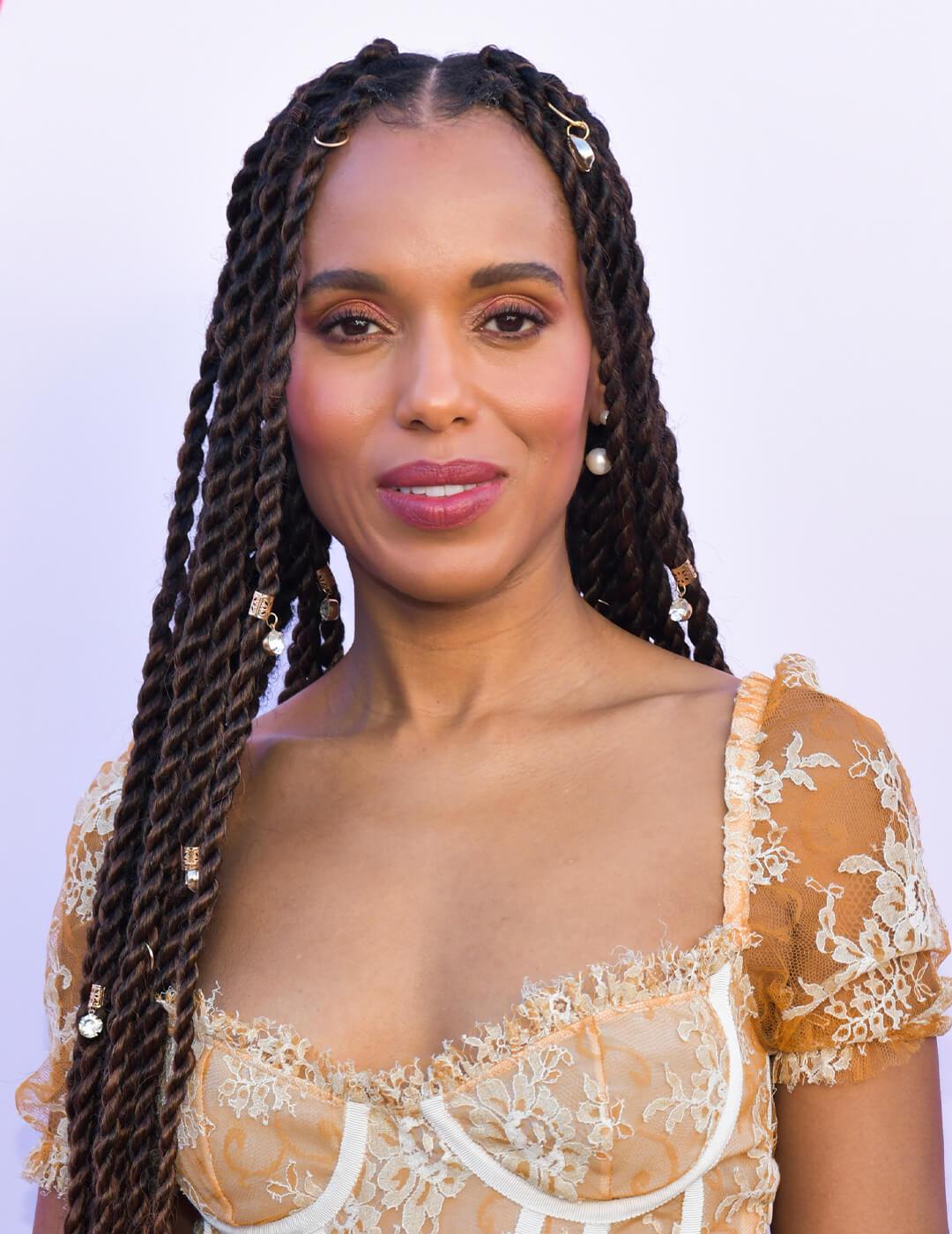 Close-up of Kerry Washington rocking a vintage-themed dress and long twists hairstyle embellished with golden hair cuffs Desktop
