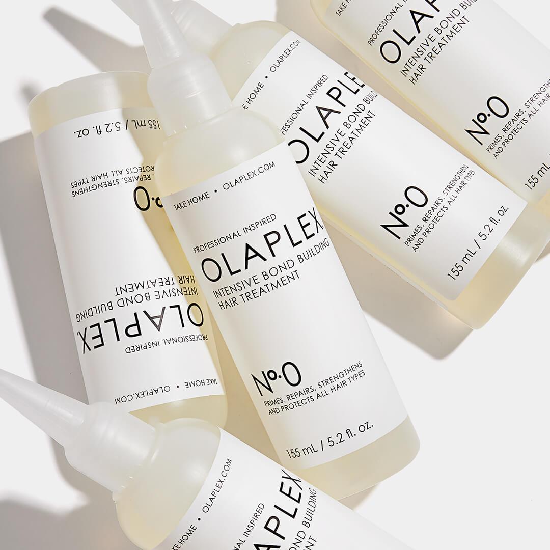 A photo of five bottles of OLAPLEX No.0 Intensive Bond Building Treatment Mobile