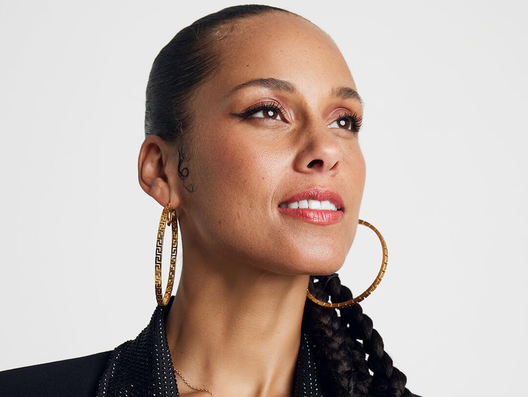 Portrait of Alicia Keys against white background Desktop