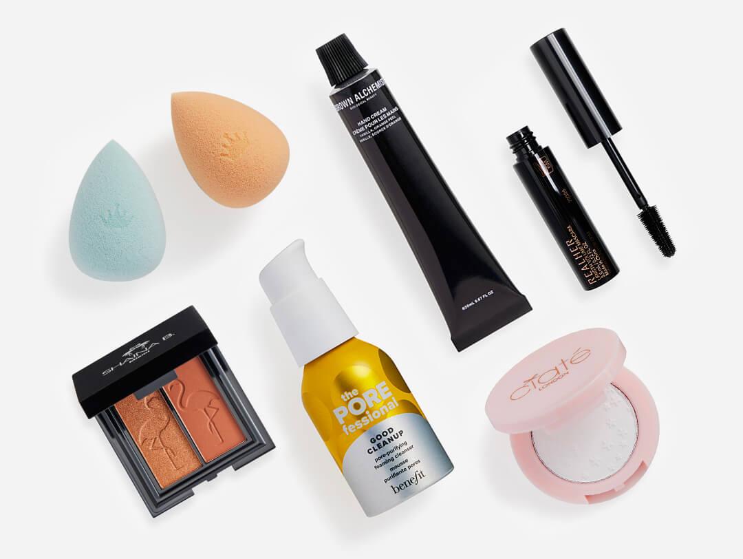Makeup, skincare, and beauty products from the April 2023 IPSY Glam Bag on white background Desktop
