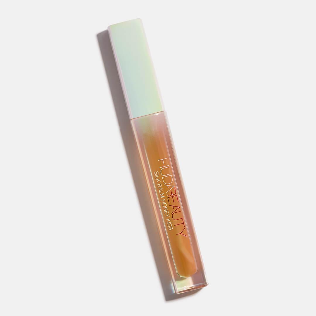 HUDA BEAUTY Silk Balm Honey Kiss Lip Balm in Queen Bee Desktop productId:p-l1h0103cccjf16nn