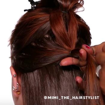 Building a waterfall braid by combining sectioned ponytails Mobile