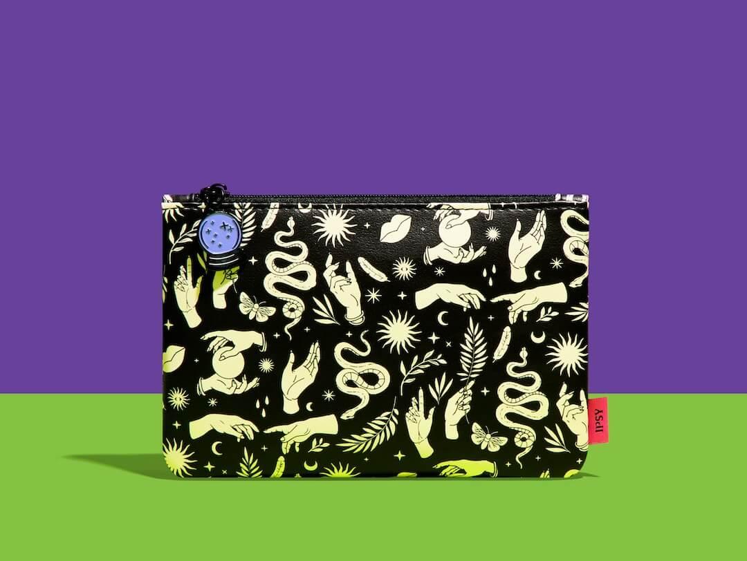 October 2024 IPSY Glam Bag over a purple and green background Desktop