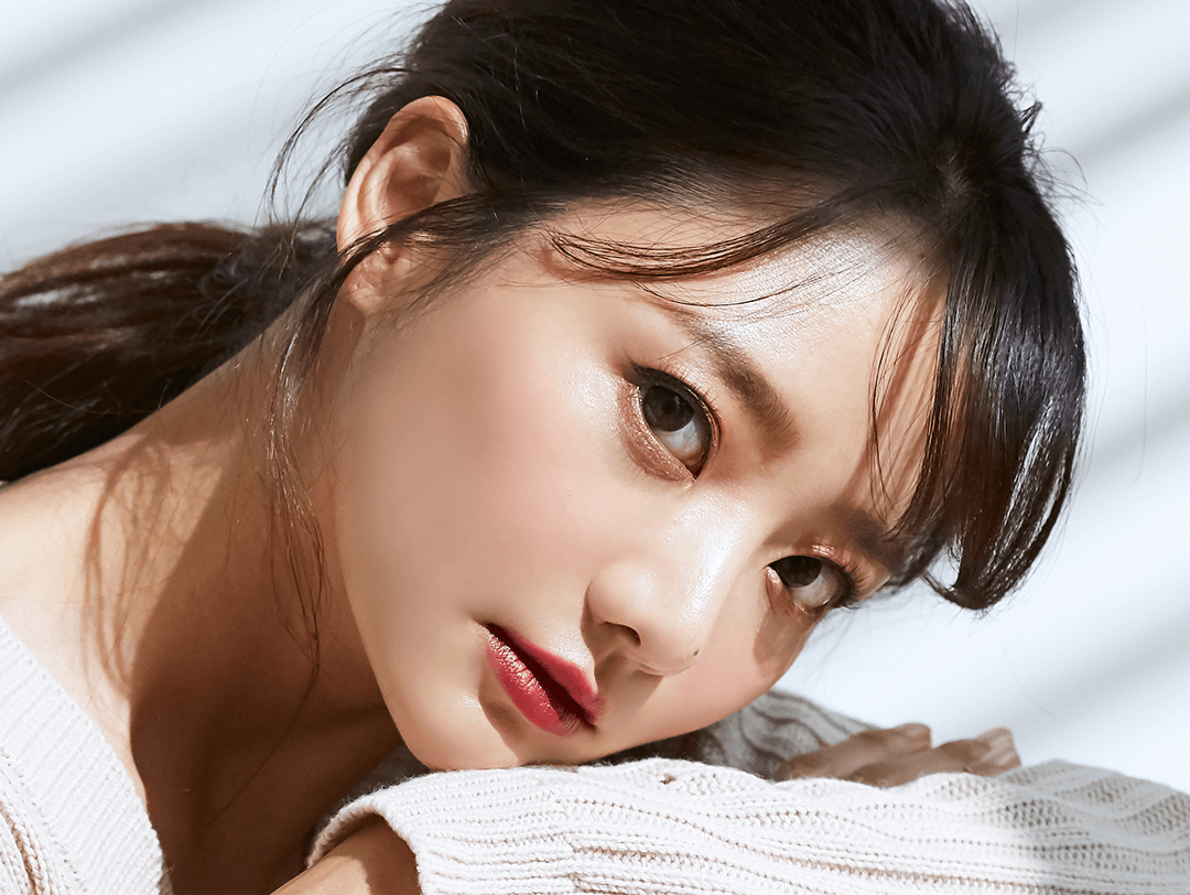 Beauty portrait of young Asian woman on light and shadow background Desktop