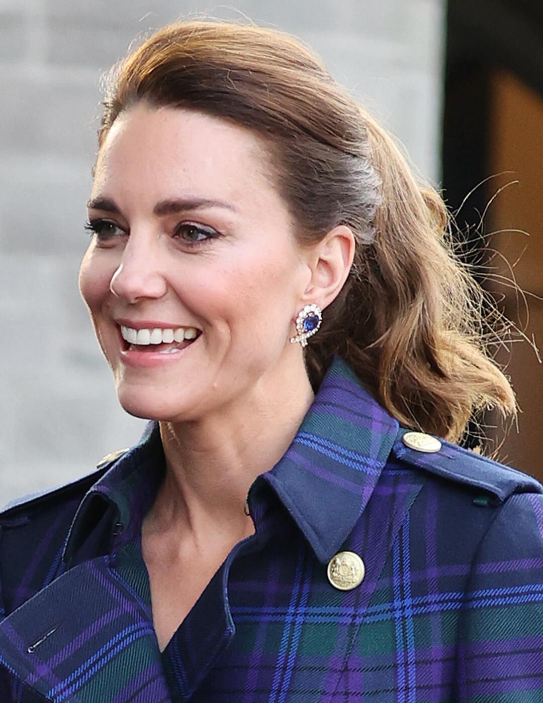 Catherine, Duchess of Cambridge rocking a pulled back ponytail hairstyle and blue plaid coat Desktop
