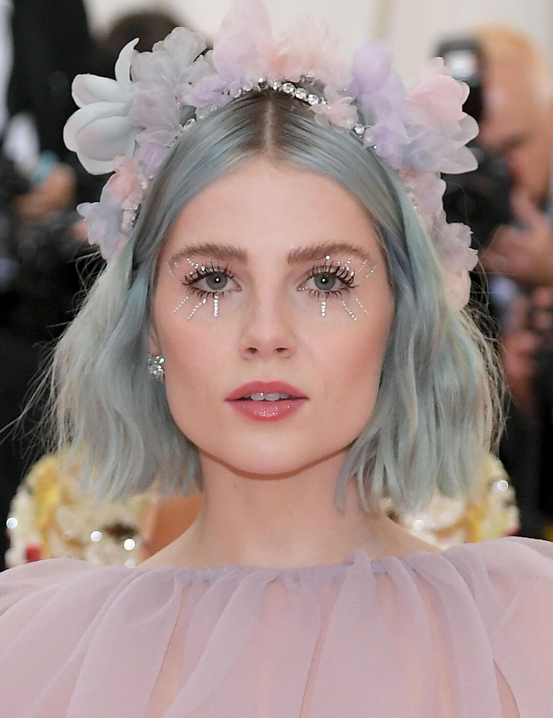 Lucy Boynton rocking a sparkly eye makeup look and lace ensemble Desktop