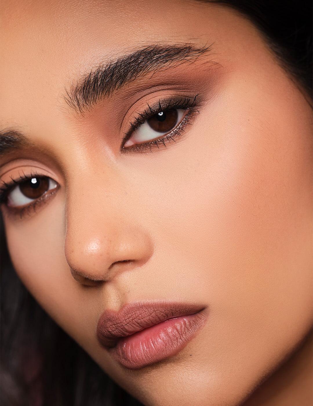 Close-up of a model's sultry eye makeup look by Ash K Holm Desktop