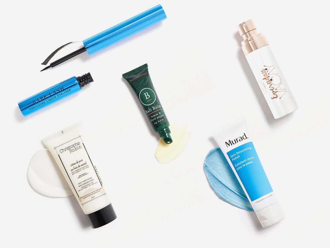 Skincare and makeup products from June 2021 IPSY Glam Bag Plus swatched on white background Desktop