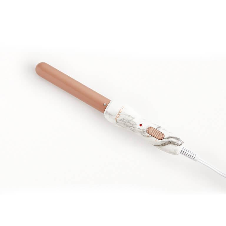 Ipsters signed up to receive a Glam Bag Plus this January might receive FOXYBAE Mini Travel Curling Wand in Marbled Desktop