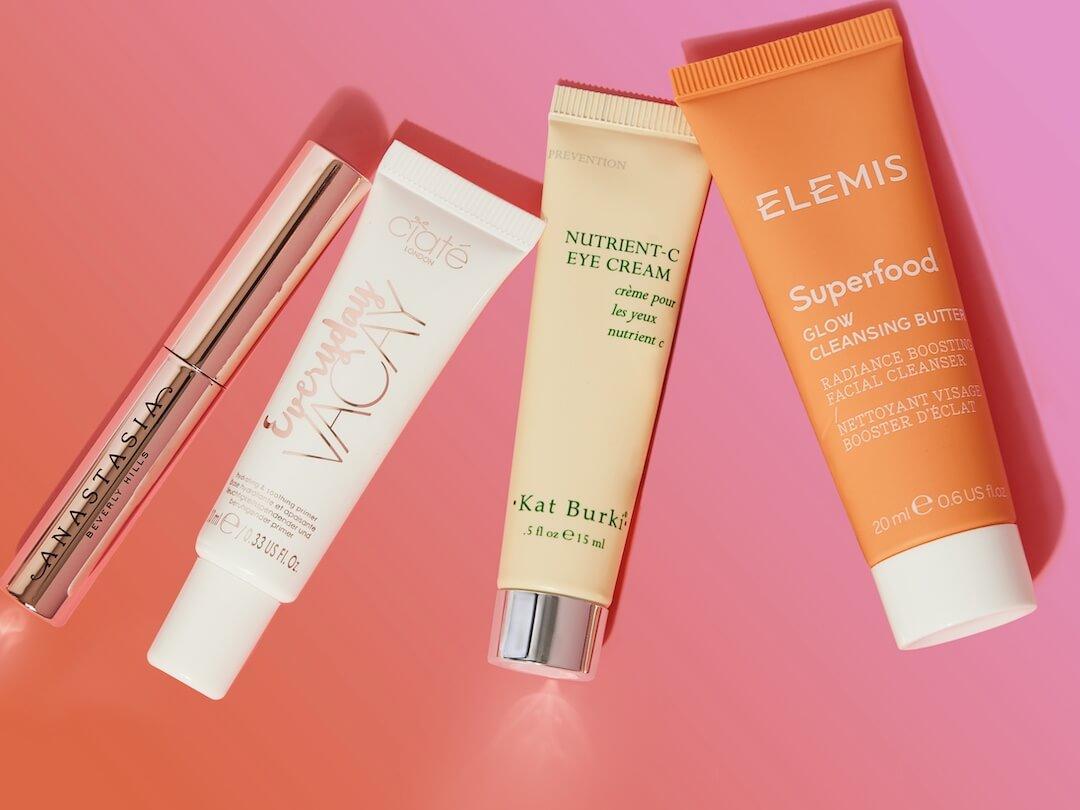 Power Picks beauty products from the May 2024 Glam Bag and BoxyCharm by IPSY on gradient pink and red background Desktop