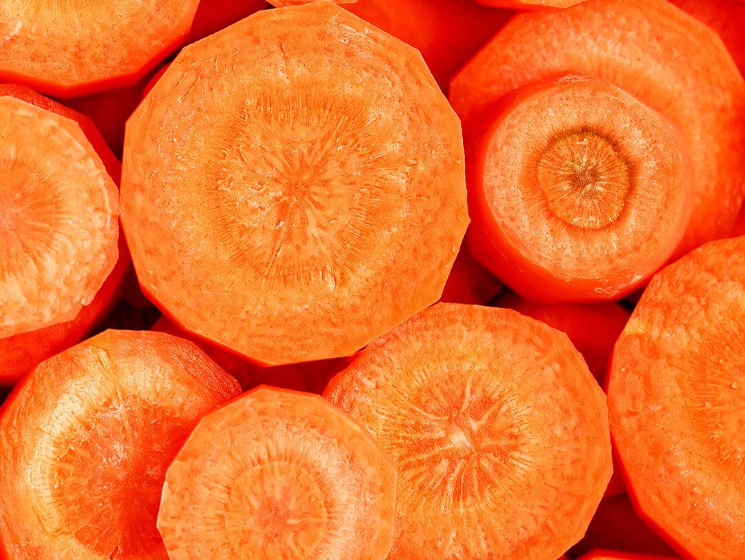 A photo of fresh carrot slices Desktop