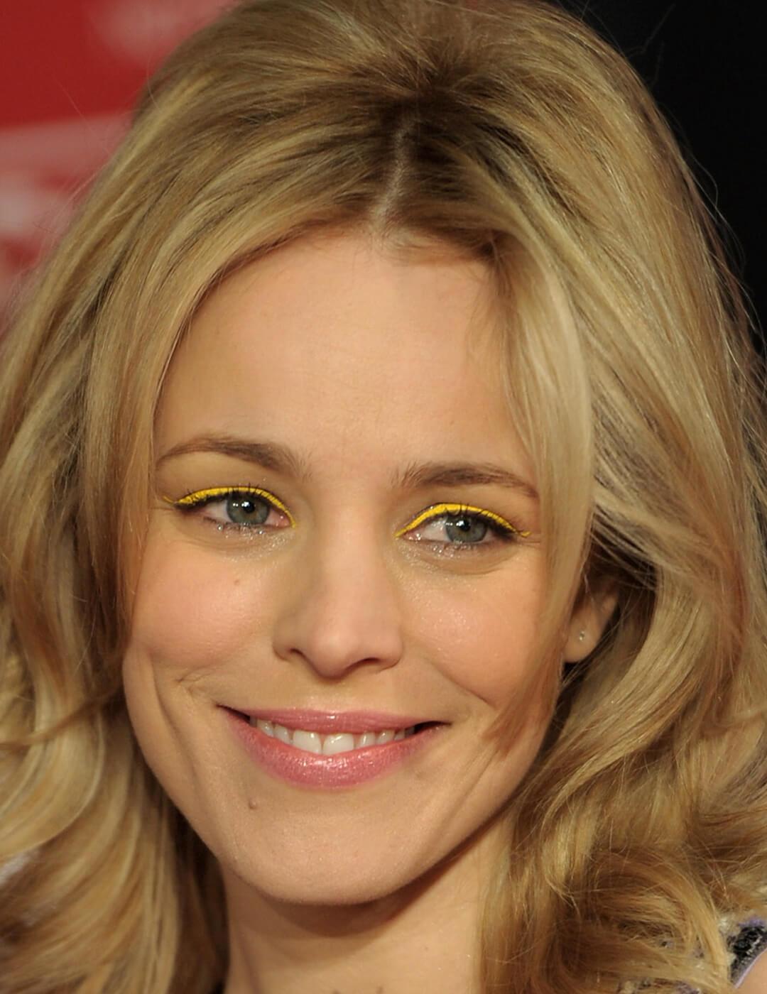 A photo of Rachel McAdams smiling in the camera with her yellow eyeshadow Desktop