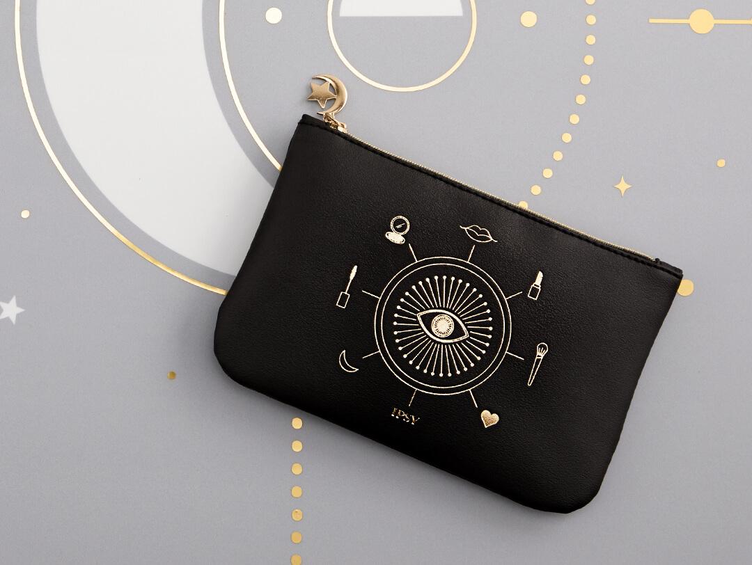 IPSY October 2020 Glam Bag on gold, white, and gray graphic background Desktop