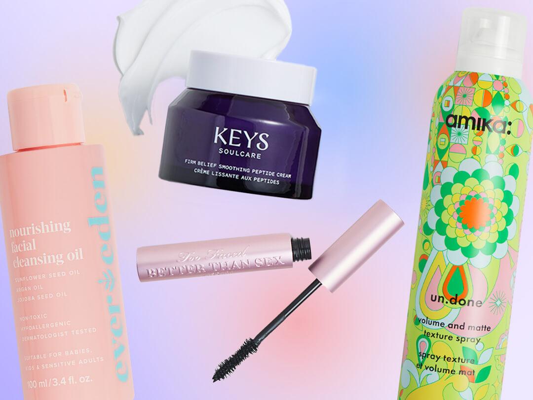 Skincare and makeup products from various brands on colorful background Desktop