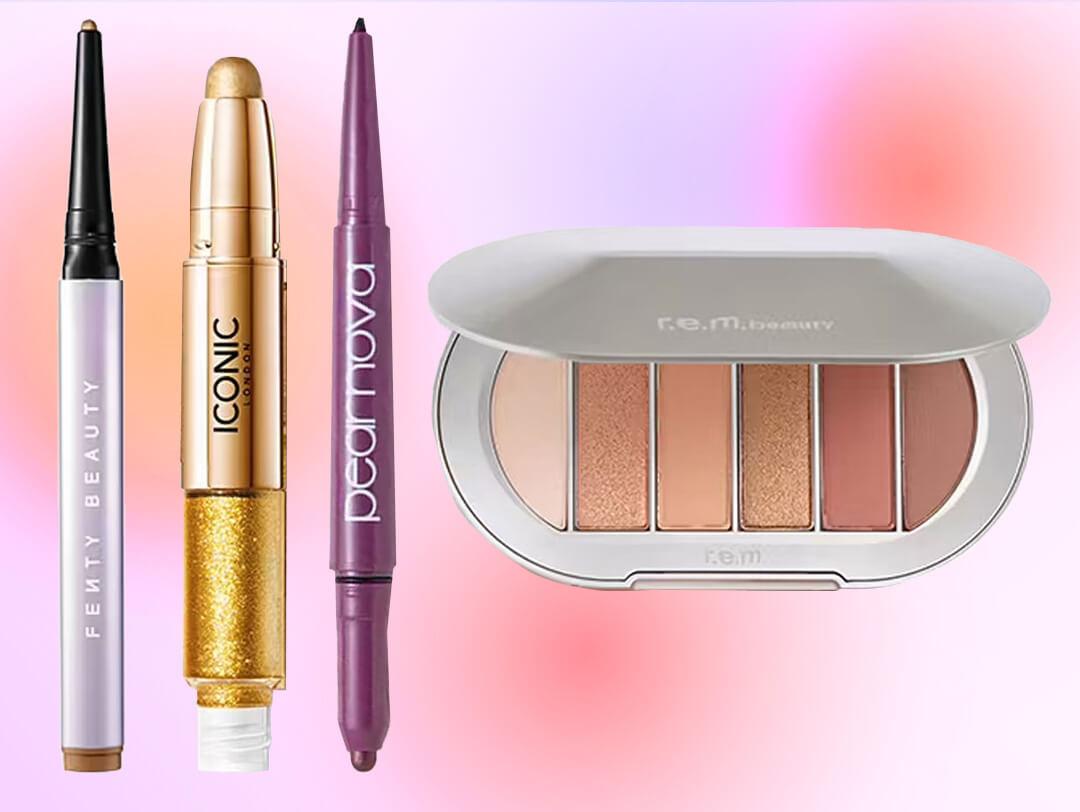 A close-up of various types of eyeshadow makeup against a pink gradient backdrop Desktop