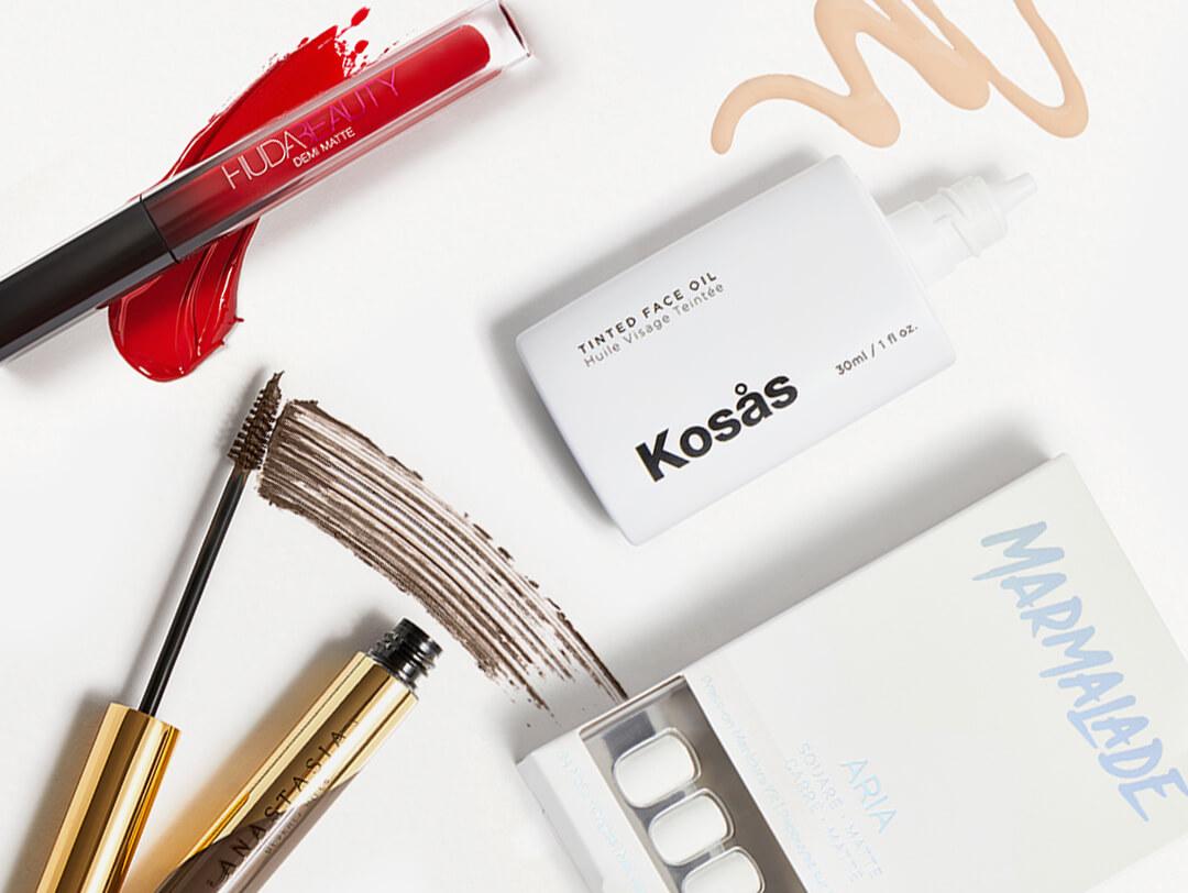 Makeup and nail products from the March 2021 IPSY Glam Bag Plus swatched on white background Desktop