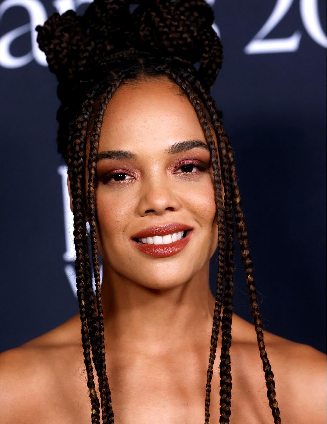 Tessa Thompson rocking braided bun hairstyle on the red carpet Desktop