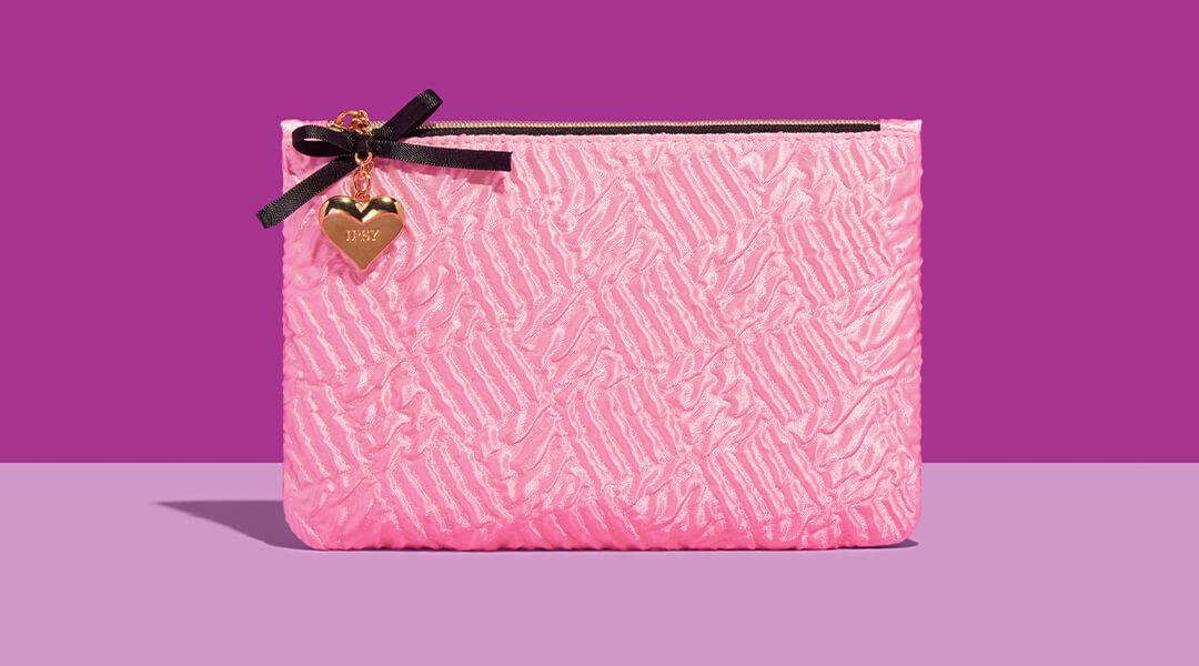 February IPSY Glam Bag on a purple background Desktop