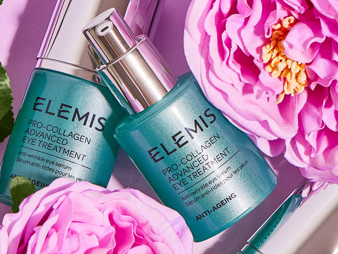 Bottles of ELEMIS Pro-Collagen Advanced Eye Treatment with pink flowers Desktop