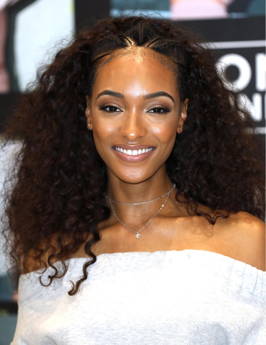 Jourdan Dunn looking glamorous in a white dress paired with an Albasso Braids hairstyle Desktop