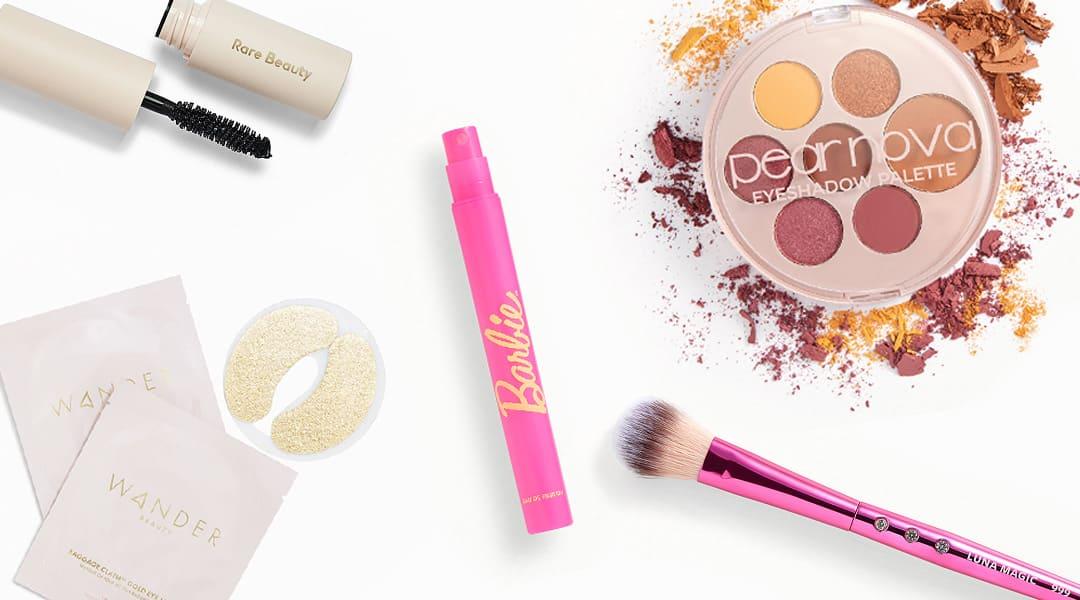 Makeup and skincare beauty products from the February 2024 IPSY Glam Bag on white background Desktop