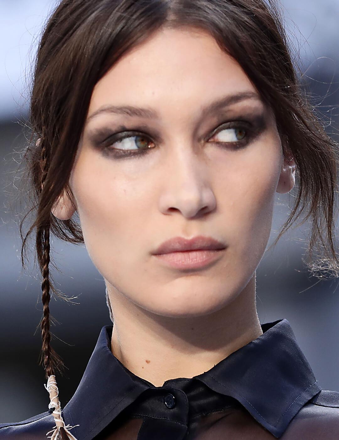 Bella Hadid looking fierce in a grungy black eye makeup look Desktop
