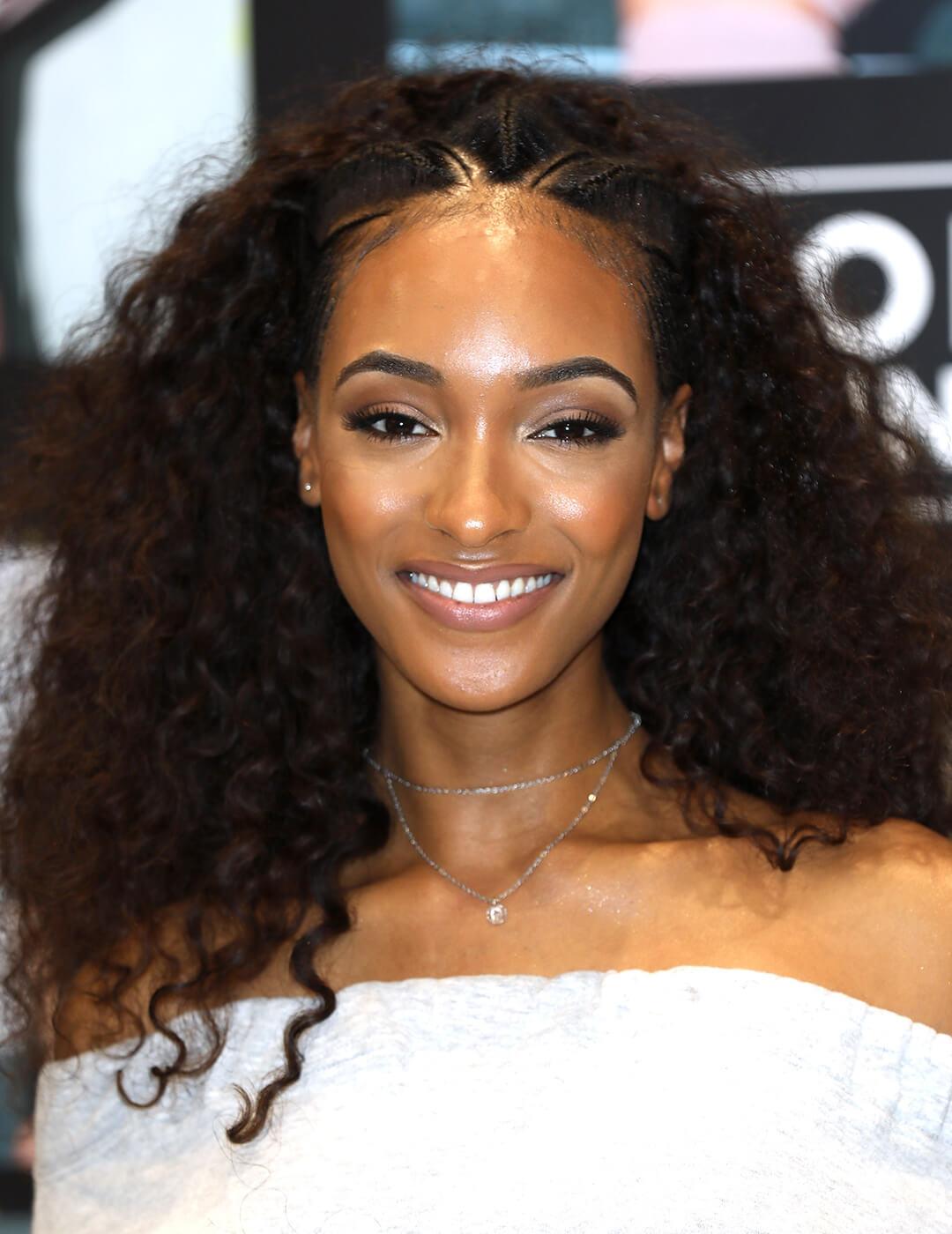Jourdan Dunn looking chic in a white dress and Albasso Braids hairstyle Mobile