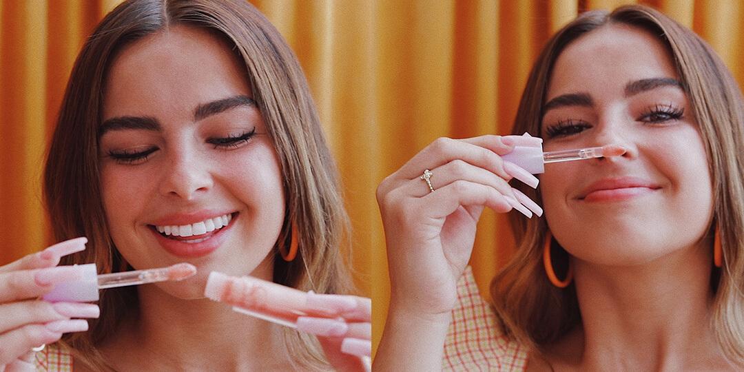 Image of Addison Rae holding and smelling the ITEM BEAUTY Lip Quip in Come Thru Desktop