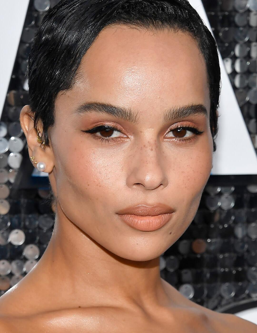 Zoë Kravitz rocking neutral makeup and a classic cat eye look Mobile