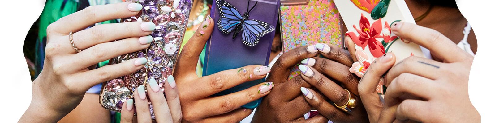 Ipsters hold up their patterned phone cases to show off their spring-inspired manicures. Desktop