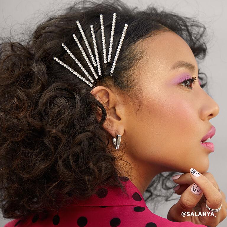 Salanya Inmaung wearing lots of embellished hairpins Desktop