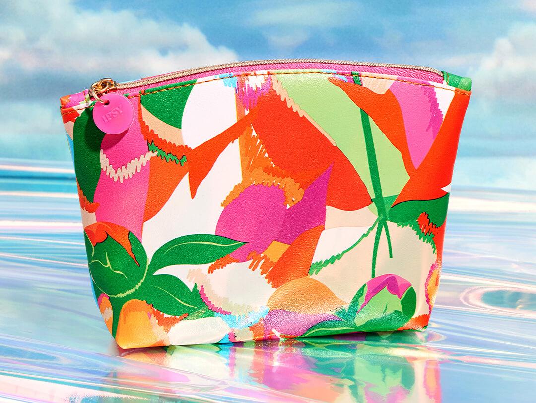 May 2023 IPSY Glam Bag on reflective and sky background Desktop