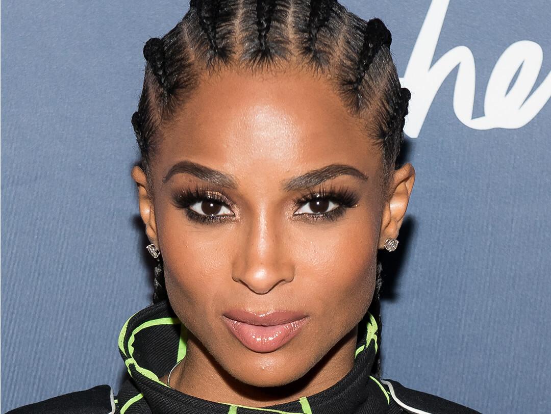 Close-up of Ciara rocking a cornrows hairstyle and smoky eye makeup look Desktop