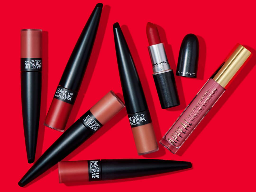 Lipsticks from APPEAL COSMETICS, M·A·C, and MAKE UP FOR EVER on red background Desktop