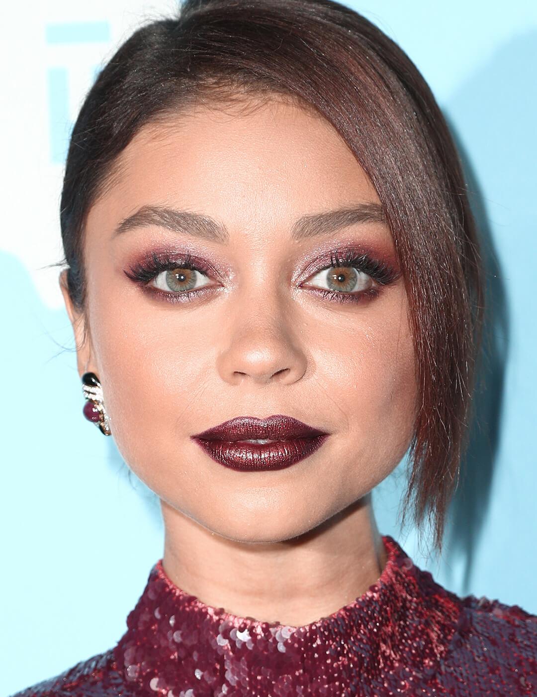 Close-up of Sarah Hyland rocking a deep burgundy eye makeup look Desktop