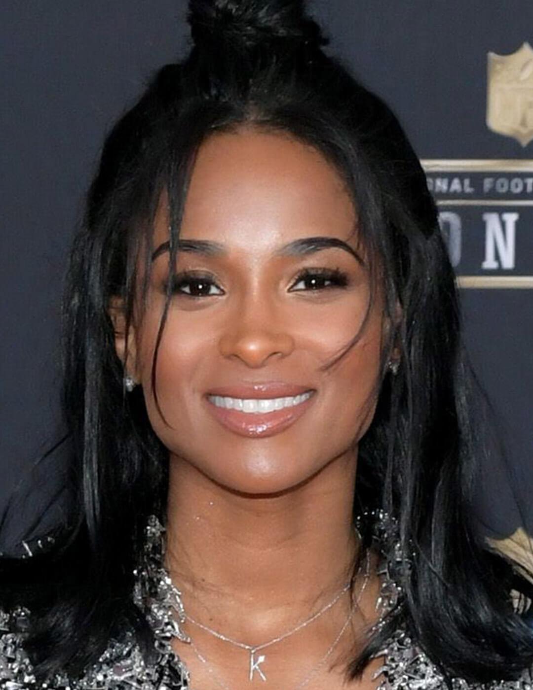 A photo of Ciara with a half-up bun Desktop