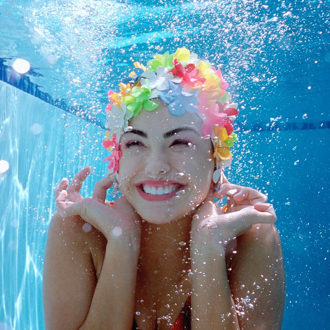 A photo of a model underwater in pool Mobile