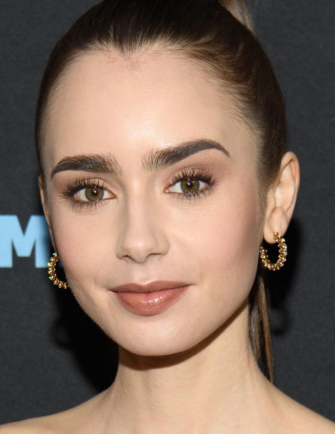 Close-up of Lily Collins with a monochromatic makeup look Desktop