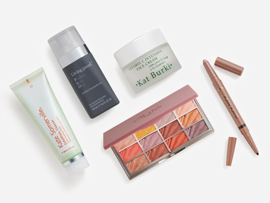 Makeup, skincare, and beauty products from the December 2022 IPSY Glam Bag Plus on white background Desktop