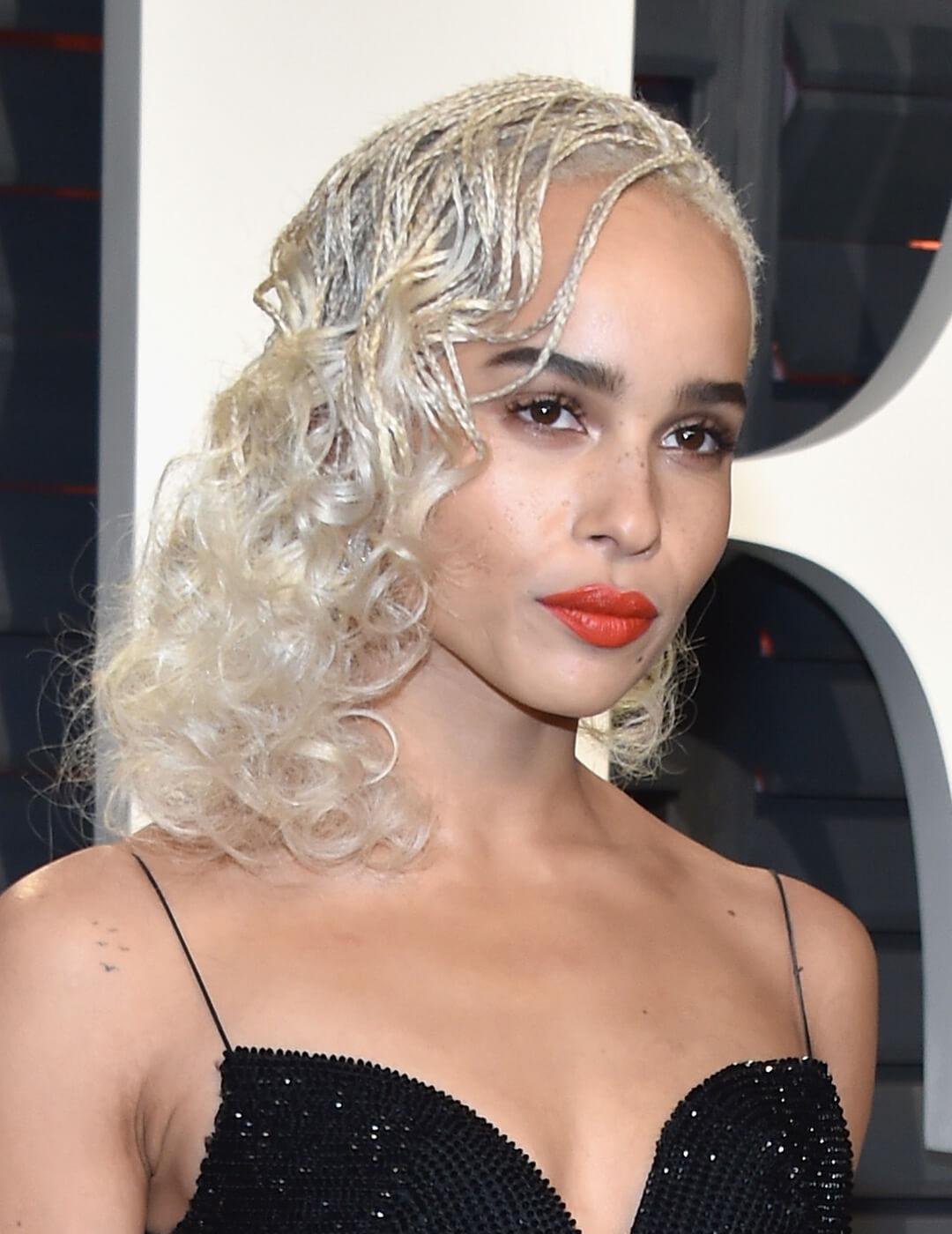 Zoë Kravitz rocking braided hairstyle and black dress on the red carpet Mobile