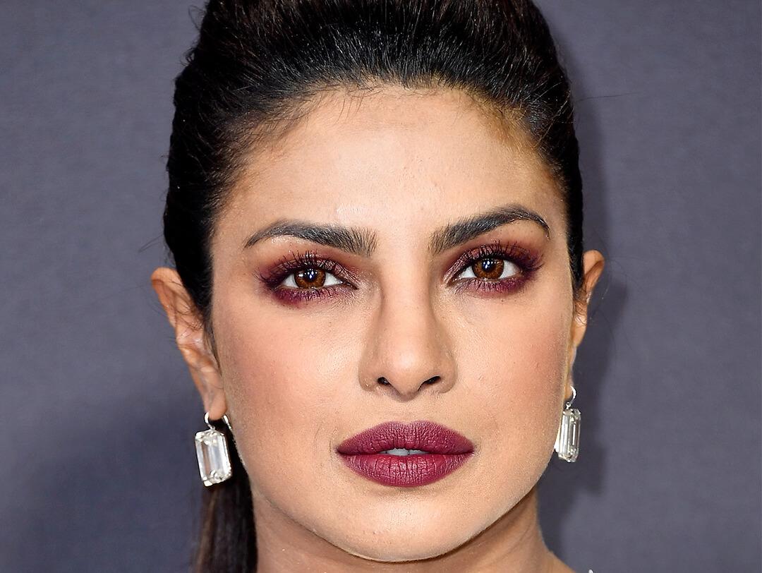 Close-up of Priyanka Chopra rocking burgundy smoky eyeshadow and berry lips Desktop