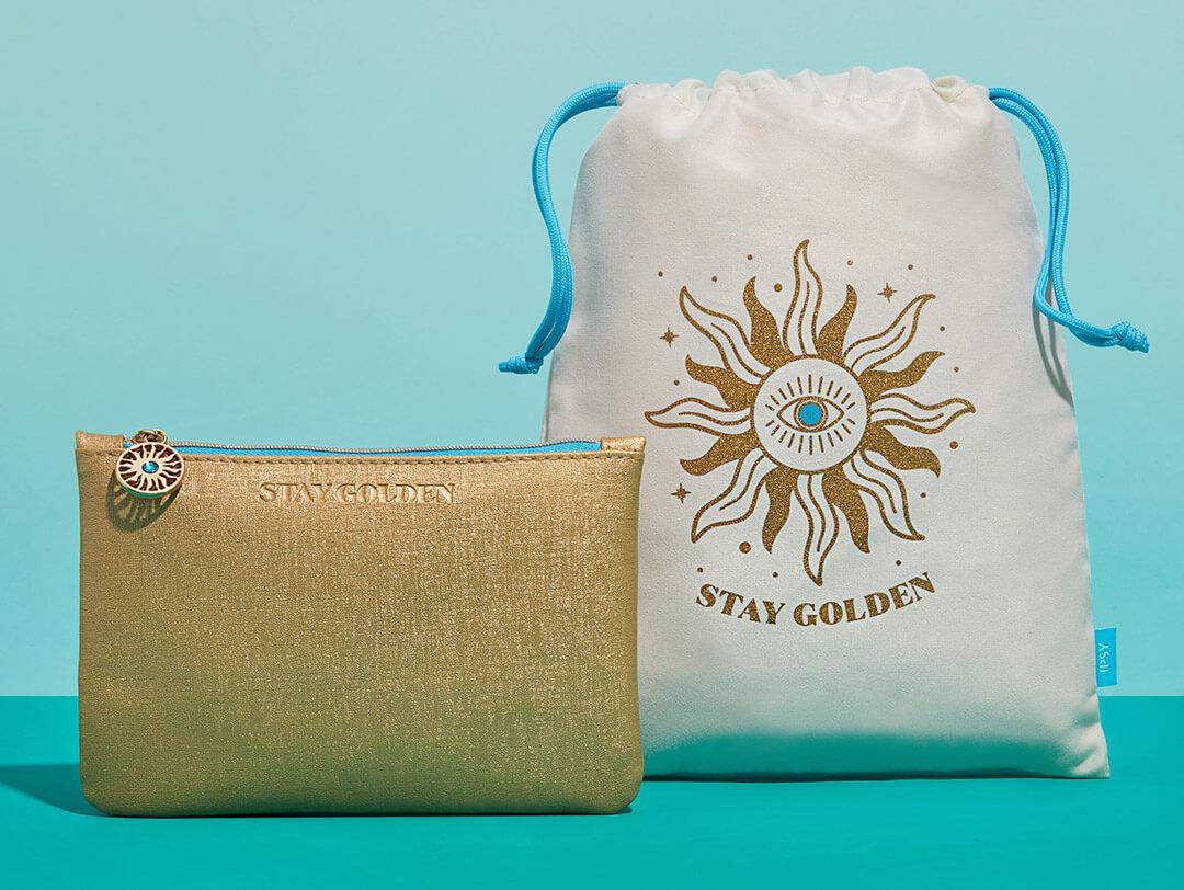 Image of the July 2021 Glam Bag and Glam Bag Plus drawstring bag against aquamarine background Desktop